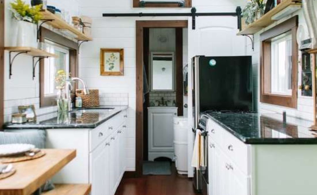 Use vertical space for storage for tiny house kitchen