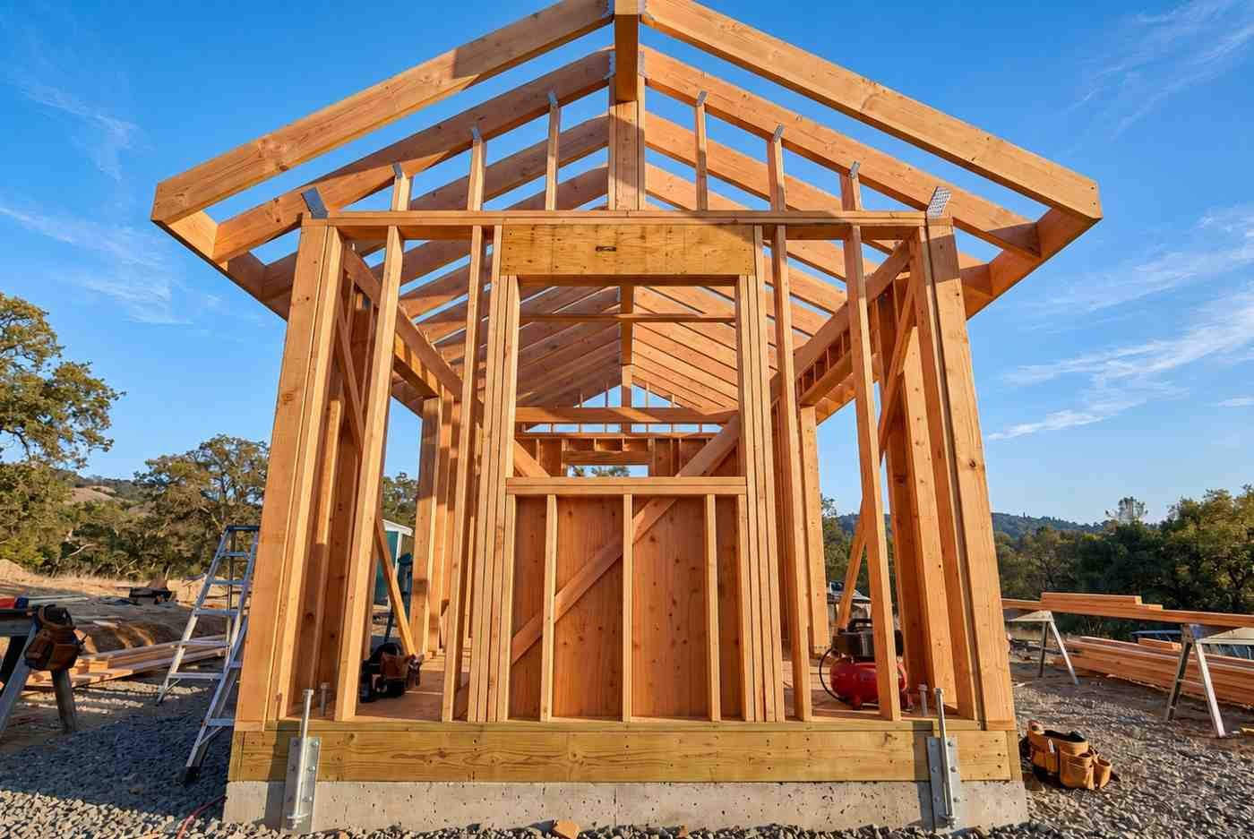 Wood frame house under construction.
